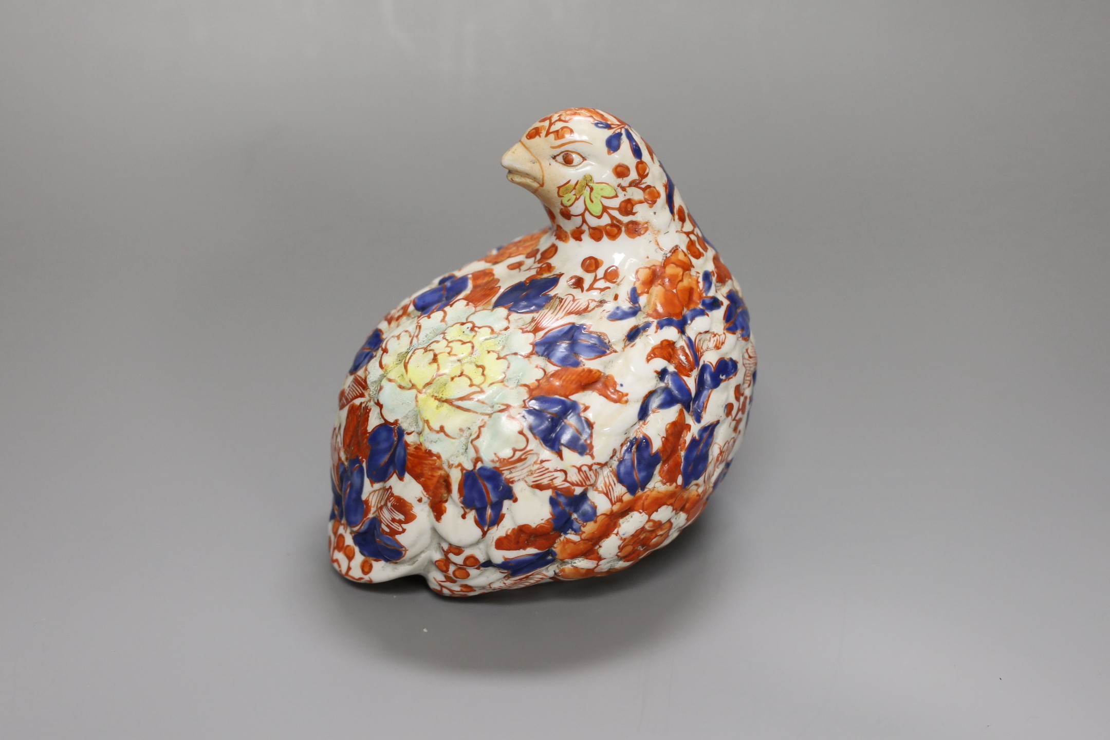 An Imari figure of a quail, signed to base. 14cm tall